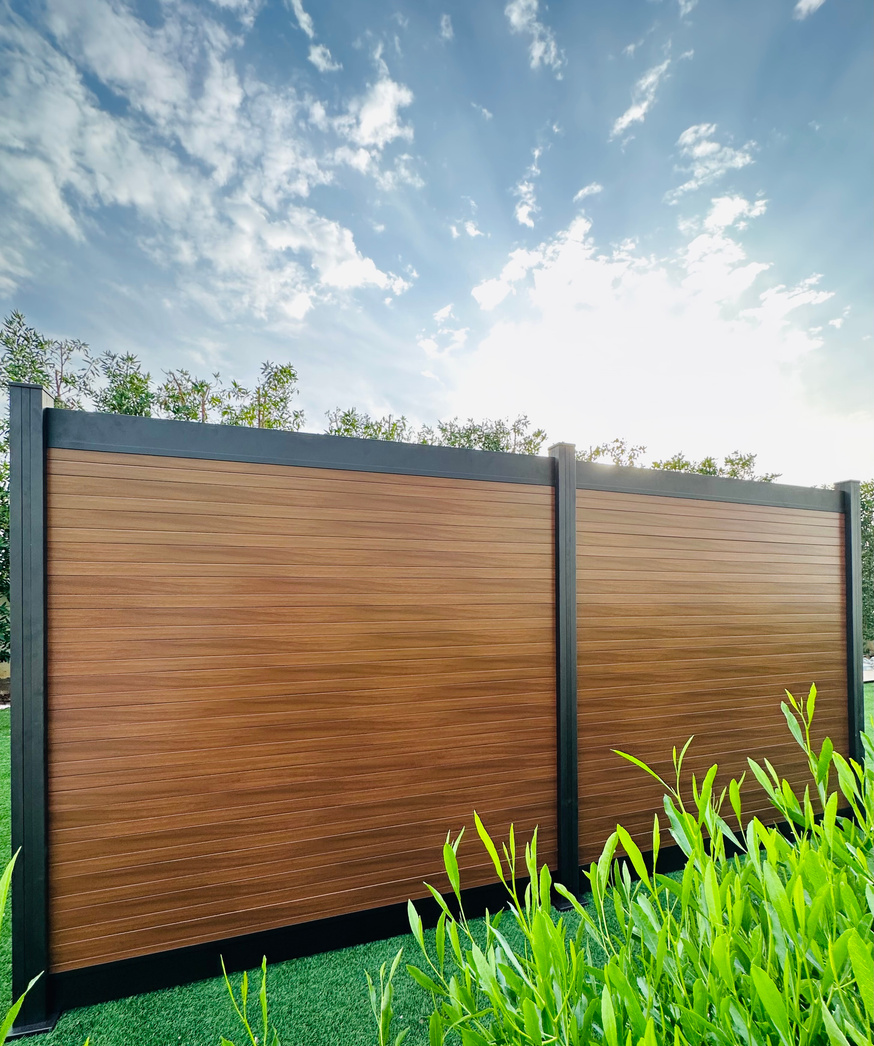 modern aluminum fence with a wood-like finish